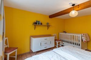 Postel nebo postele na pokoji v ubytování Haus Am Waldrand