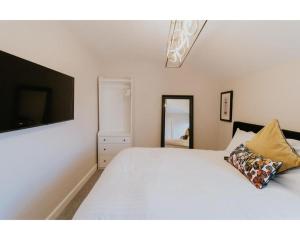 Ένα ή περισσότερα κρεβάτια σε δωμάτιο στο Central Ballycastle Beach Residence +15 φωτογραφίες