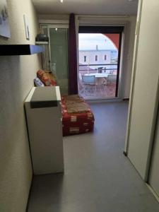 Postel nebo postele na pokoji v ubytování Leucate