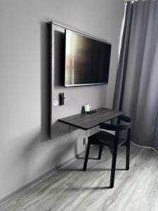 TV a/nebo společenská místnost v ubytování City Central Hotel Örebro by First Hotels