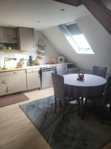 Kuchyň nebo kuchyňský kout v ubytování Chambres de Fabienne + 18 fotografií