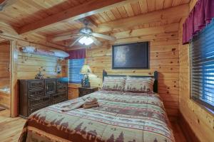 Voodi või voodid majutusasutuse 2020 Land Of Promise Way Cabin toas