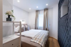 Postel nebo postele na pokoji v ubytování Appartement Auszeit