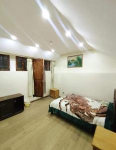 Voodi või voodid majutusasutuse Hostal Atlantis toas
