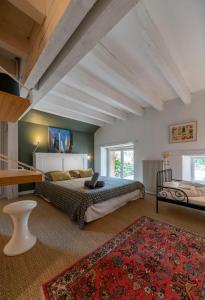 Postel nebo postele na pokoji v ubytování Grande Maison Creuzier - Villa 3 chambres et jardin