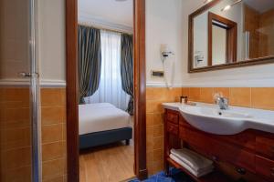 Postel nebo postele na pokoji v ubytování Hotel Oceania
