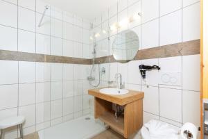 Vannituba majutusasutuses Appartement Predigstuhlblick mit Indoorpool und Sauna