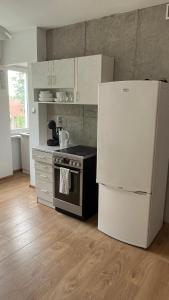 A kitchen or kitchenette at Comfy, nice and small room in Krakow 5
