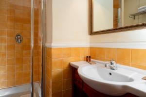 Koupelna v ubytování Hotel Oceania