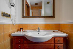 Koupelna v ubytování Hotel Oceania