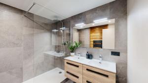 a bathroom with a sink and a shower at Nouveau ! Chalet pied des pistes in Champagny-en-Vanoise