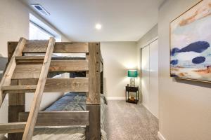 a bunk bed in a room with a ladder at Quiet Pueblo Home with Pool Table, 5 Mi to Downtown! in Pueblo