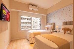 Modern Apartments in Puerto Madero客房内的一张或多张床位