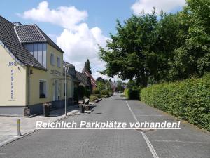 an empty street in a small town with houses at Bed & Breakfast in Legden in Legden