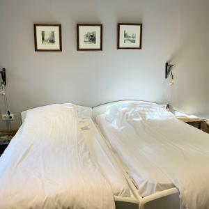 Postel nebo postele na pokoji v ubytování Hotel Breedsicht