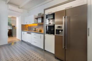 A kitchen or kitchenette at Lindos Allure Villa with Jacuzzi and Acropolis view!!!