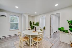 a white dining room with a white table and chairs at Luxurious 2BD family friendly, central in Philadelphia