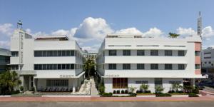 
a large white building with a large window at Dream South Beach in Miami Beach
