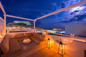 A seating area at Lindos Allure Villa with Jacuzzi and Acropolis view!!!