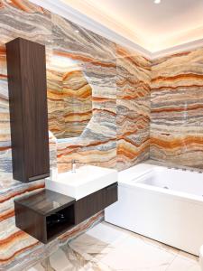 Koupelna v ubytování Ricci Palace Suites