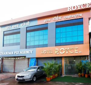 a car parked in front of a hotel at Hotel Royce Executive Near US Consulate, Bandra Kurla Complex in Mumbai