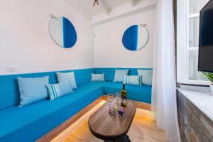 A television and/or entertainment centre at Lindos Allure Villa with Jacuzzi and Acropolis view!!!