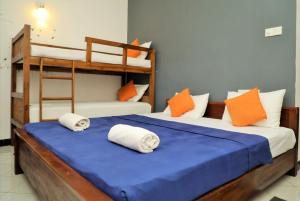 Ένα ή περισσότερα κρεβάτια σε δωμάτιο στο Andorra Tourist Resort Anuradhapura