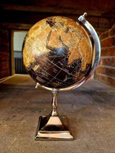 a globe on a stand on a table at The Hamilton Luxury Let-The Duke in Scorton