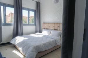 Postel nebo postele na pokoji v ubytování Hotel Warda