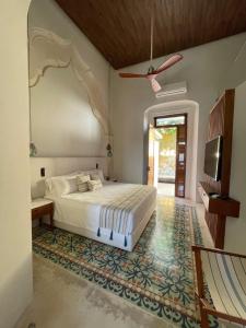 Postel nebo postele na pokoji v ubytování Las Lupitas Hotel Boutique