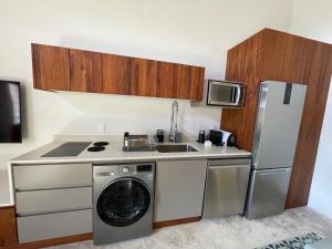 Kuchyň nebo kuchyňský kout v ubytování Las Lupitas Hotel Boutique