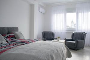 Postel nebo postele na pokoji v ubytování Meli apartman