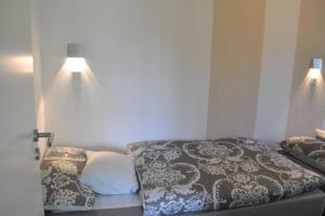 Postel nebo postele na pokoji v ubytování Haus Matti