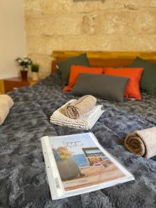 En eller flere senger på et rom på Sliema's Seaside Charmer
