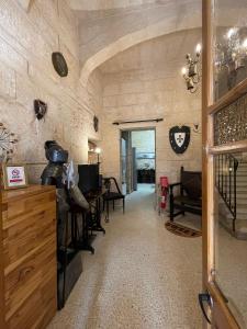 Posezení v ubytování Sliema Townhouse for 12, July Deal, Historic Charm, Steps to Seafront View & Bars & Promenade