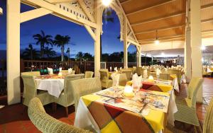 Restoran atau tempat lain untuk makan di TI OASIS Trinidad, Studio vue Mer à P&Vac village-club