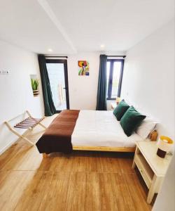 Ένα ή περισσότερα κρεβάτια σε δωμάτιο στο Vila Loki