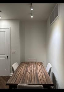 a conference room with a wooden table and chairs at Glendale Apartment 2Bed-2Bath in Glendale