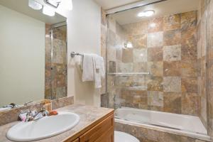 a bathroom with a sink and a shower at Bear Creek Lodge 110A in Telluride