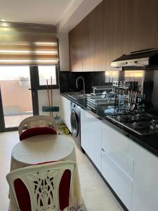 A kitchen or kitchenette at Menara Garden Pool Appartement