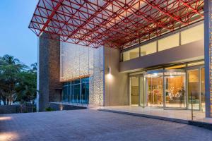 an exterior view of a building with a metal roof at Hilton Santa Marta in Santa Marta