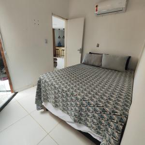 a bedroom with a bed in a room at Casa Lenger in Aracaju +9 photos