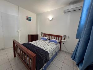 Un ou plusieurs lits dans un hébergement de l'établissement Maison type F4 vue sur mer