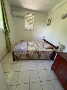Un ou plusieurs lits dans un hébergement de l'établissement Maison type F4 vue sur mer