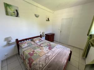 Un ou plusieurs lits dans un hébergement de l'établissement Maison type F4 vue sur mer