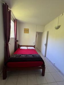 Un ou plusieurs lits dans un hébergement de l'établissement Maison type F4 vue sur mer