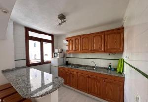 A kitchen or kitchenette at Beautiful 2 bedroom apartment near Puerto Rico beach