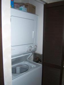 a microwave sitting on top of a washing machine at Sugar Beach 132 - MCH in Kihei