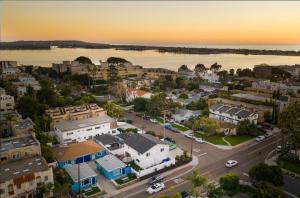 an aerial view of a town with a river and houses at Indigo By AvantStay Sleek Charming Home 2 Blks from Bay w Hot Tub in San Diego