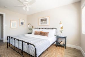 a bedroom with a bed and a ceiling fan at Seashore III by AvantStay In the Heart of La Jolla 5mins from the Beach in San Diego